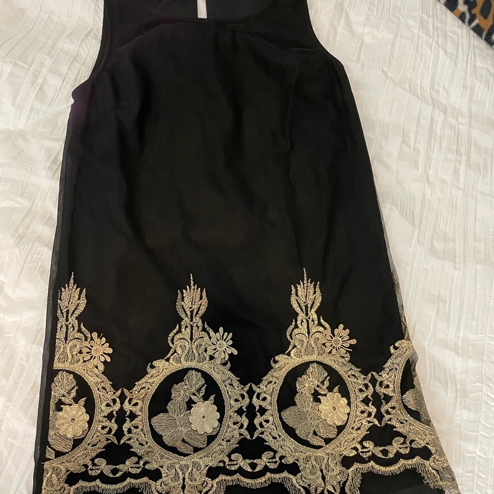 Little black dress with gold embroidered details 💫